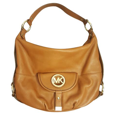 where can i pawn my michael kors purse|Michael Kors handbags second hand.